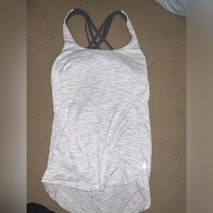 Lululemon tank top with open back and built in bra. Only worn a couple times!